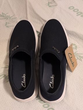 Clarks Navy Slip-On Casual Sneakers with White Sole